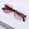 Rimless Photochromic Sunglasses for Men & Women (Pink Lens | Golden Frame - MG7806)